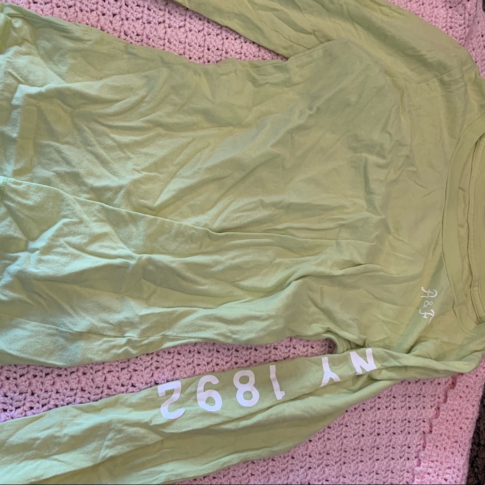 Green Abercrombie and Fitch shirt.